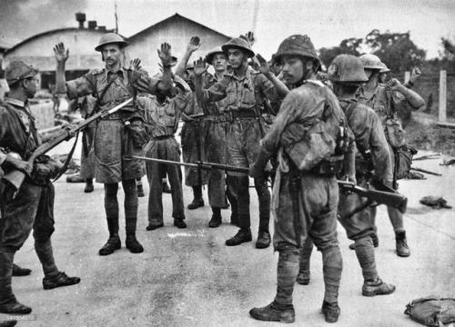 historicaltimes: British Soldiers Surrender to the Japanese Army during the Battle of Singapore, Feb