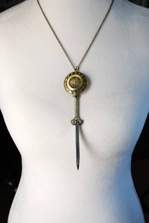 ⚡Sword & Shield Lariat Necklace: $25.50⚡➳Detailed pendants in the style of Wonder Woman’s 