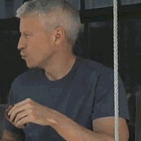 lus-e:  Just Anderson Cooper eating a hotdog 