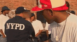 theblancolife:  Lloyd Banks trying to steal a gun from a NYPD cop….thats wild