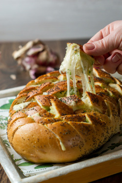 housewifeswag:  foody-goody:  Recipe: Gouda &amp; Garlic Butter Pull Apart Bread  get inside my (mouth) orifice immediately for testing