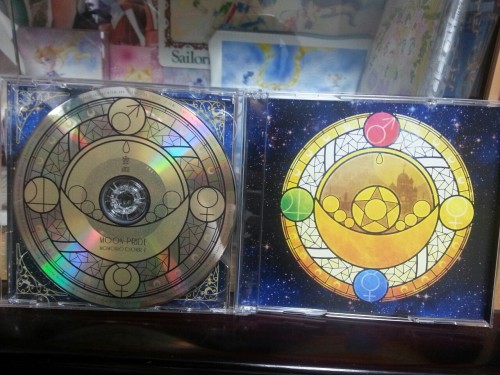 triaelf9:Moon Pride CD + Blueray, Collectors cards from Gamers in JapanI tried to scan the back and 