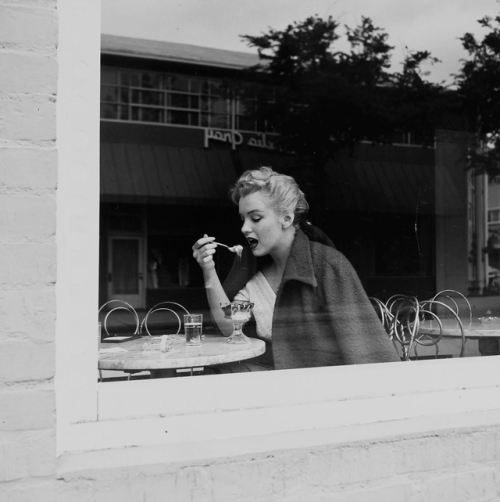 marilynmonroeposts: Marilyn Monroe at Wil Wright’s Ice Cream Parlor. Photo by Andre de Dienes, 1953.