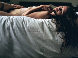 creativerehab:  Shakti on a Highline Hotel bed #4. Lo-res 120 film scan. 