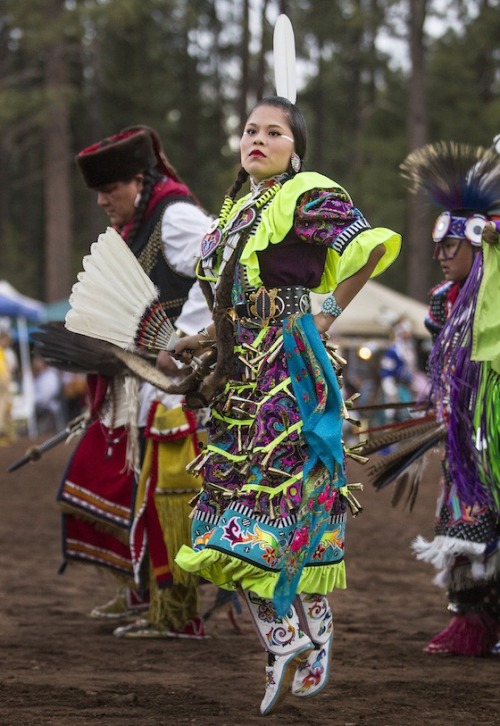 blue-cattleya:Navajo Jingle-dress dancer Yanabah Redhouse dances during the 16th Annual Pow Wow in i