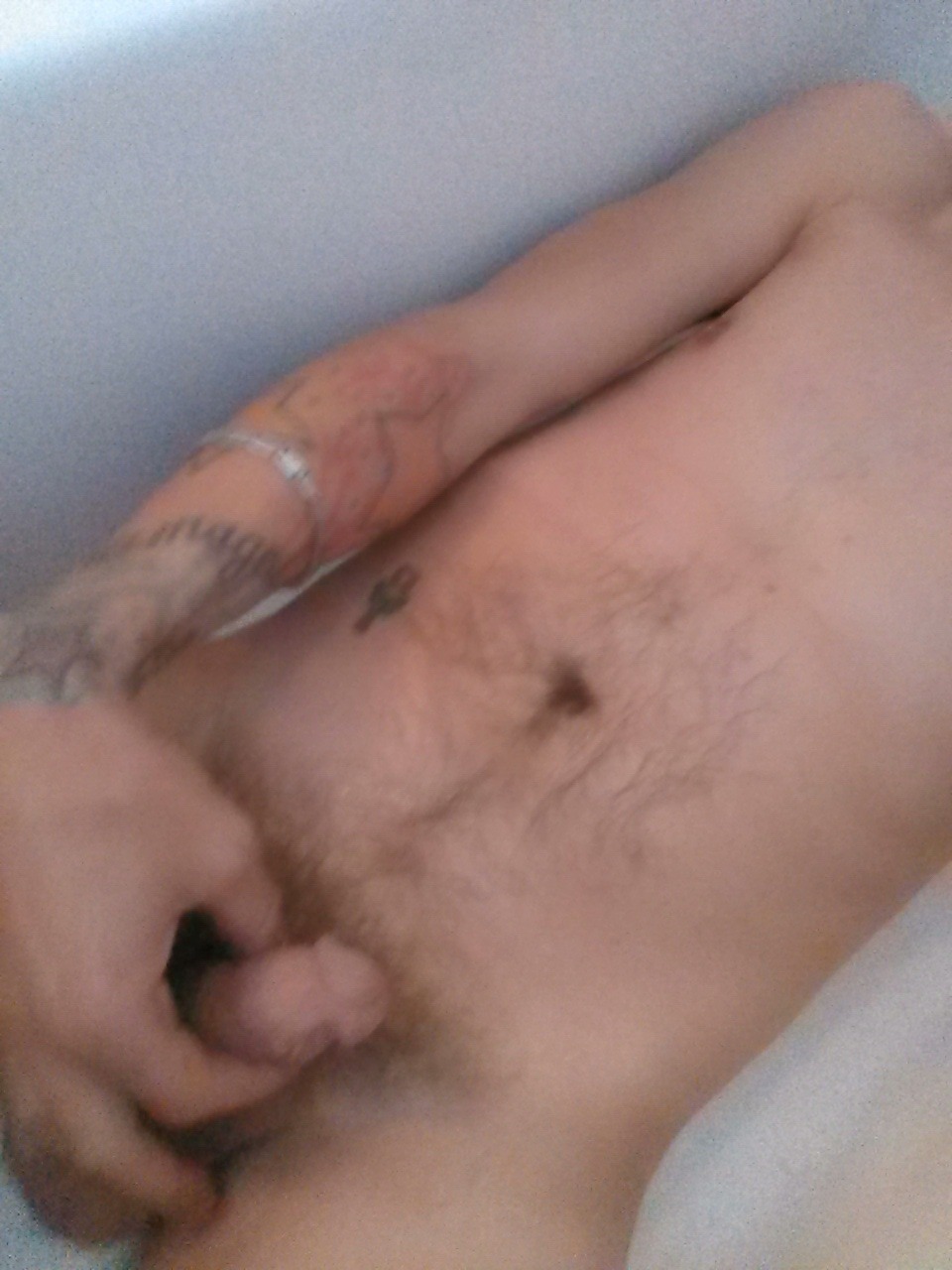 tattootodd80:  Had to piss so decided to lay down in the bath