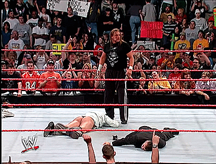 Vince McMahon pedigreed by Triple H.
