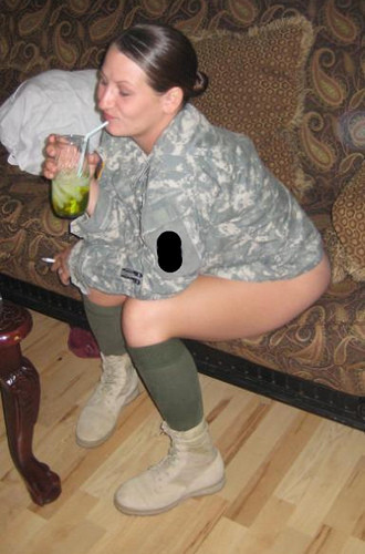 militarysluts:  Army SSG strips out of her uniform and sucks dick.