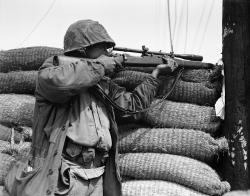 militaryhistoryphotos:  A U.S. Marine Marksman