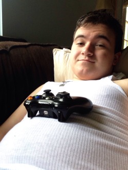 anythingoes29:  Perks of having a belly: Great place to rest an Xbox controller