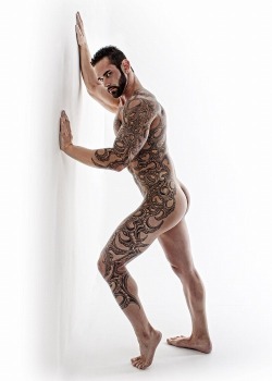 Handsome man with exceptional ink work -