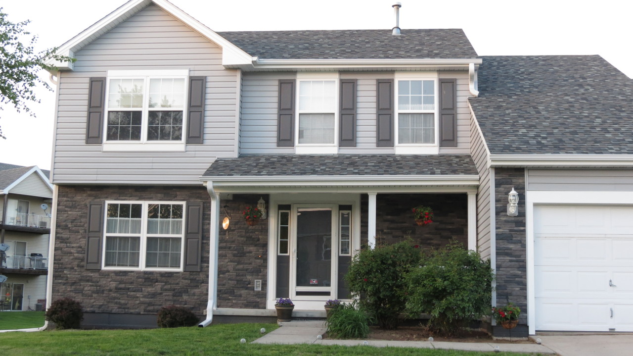 <p>On this home we did everything from Roof, Siding, and Gutters. The stone is actually a vinyl siding.</p>