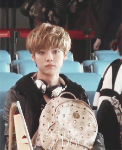 wooyoung:  luhan looking cute while sitting ・ω・           Lol he has no idea what to do