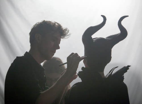 xo-jolie:  Applying makeup on the set of Maleficent.This picture is found in the Maleficent iBook.