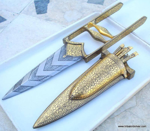 Incredible gold decorated damascus steel Indian katar on sale for $2,650 on etsyfrom tribaloldsilver