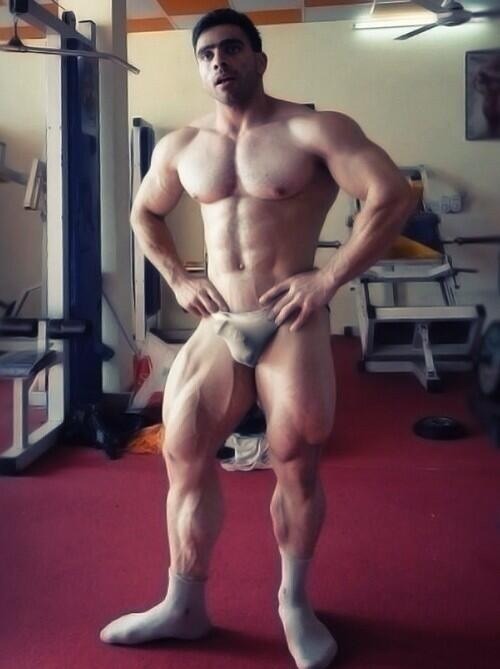 Muscular, sexy with awesome pecs, nips and a bulge that is an eye catcher.  WOOF