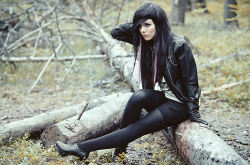 Black tights, leather jacket and skull print t-shirt