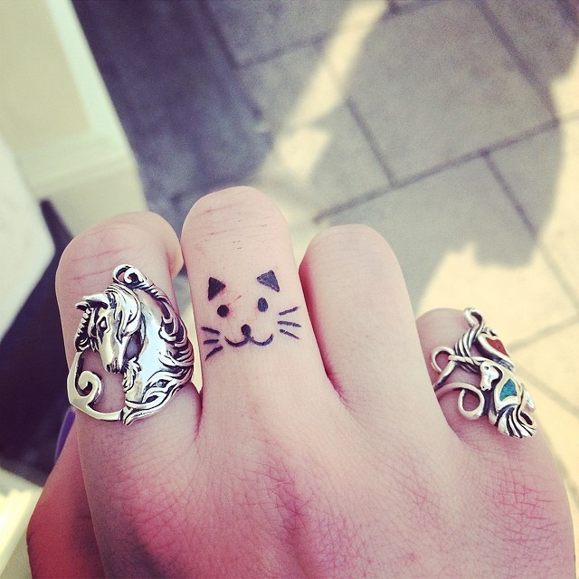 Cute small finger tattoos