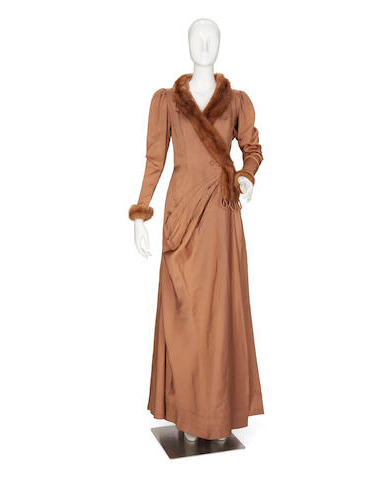 recycledmoviecostumes:This costume, designed by Edith head was first worn by Judith Anderson as Flo 