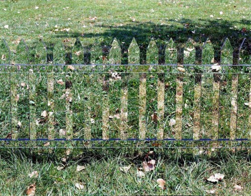 A Fence of Mirrors Reflects the Changing Landscape Created by artist Alyson Shotz