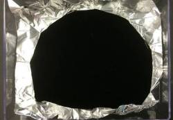 putthison:  Scientists Develop a Darker Black Really dark black is apparently the new black. From The Independent:  A British company has produced a “strange, alien” material so black that it absorbs all but 0.035 per cent of visual light, setting