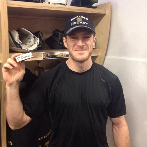 Better late than never: Kevan Miller smiles with the puck he scored his first NHL goal against the Maple Leafs this morning before the B’s head out to morning skate in Calgary. #nhlbruins