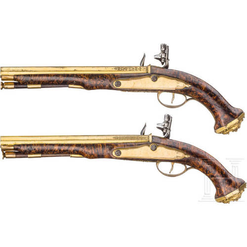 A pair of brass barreled flintlock pistol crafted by Felix Werder of Zurich, Switzerland, circa 1660