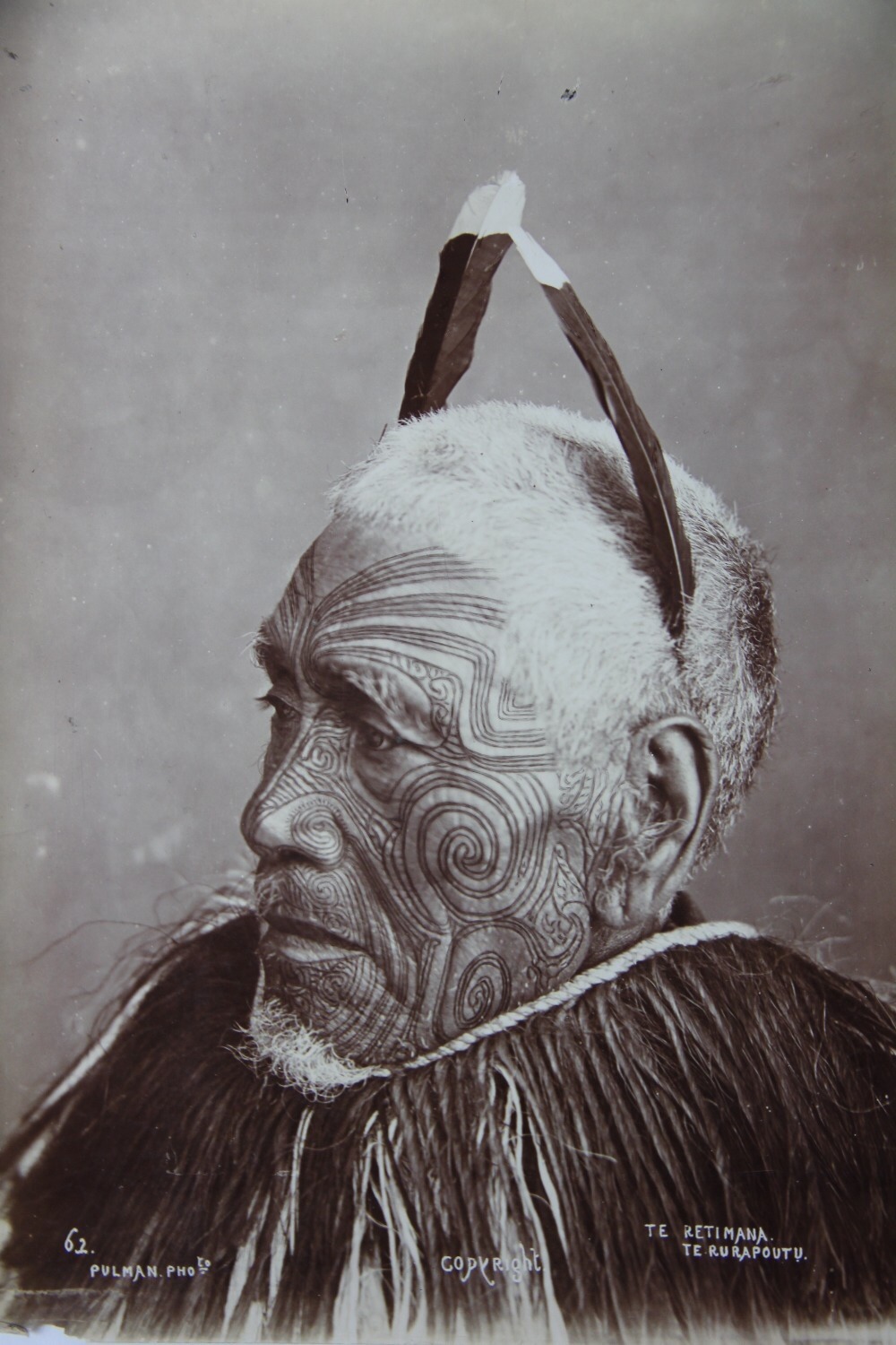 Elizabeth Pulman (1836-1900) - Te Retimana Te Rurapoutu
Albumen photograph. Taken c.1880′s
Pulman is regarded as New Zealand’s first professional female photographer. Note the now extinct huia’s feathers in his hair.