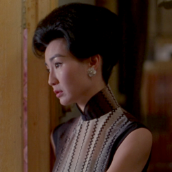 hoanbee:  Maggie Cheung wears a different cheongsam (qipao) dress in each scene of Wong Kar-Wai’s In the Mood For Love. There were 46 in all, though not all made it to the final cut. 