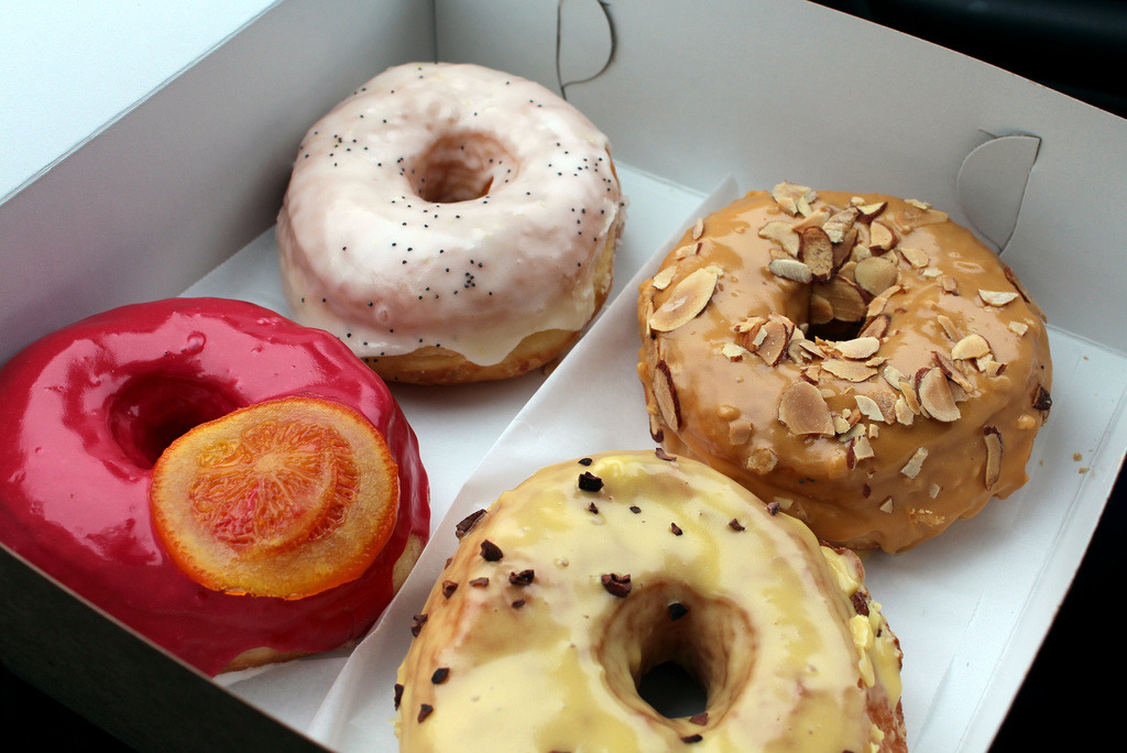 f-word:  donuts!: lemon poppy seed, dulce de leche, passionfruit with cocoa nibs,