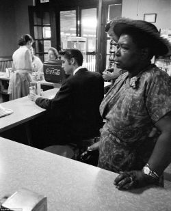 bitterbitchclubpresident:  rudegyalchina:  fabulazerstokill:lovekayrock:accras:historicaltimes:At a segregated lunch counter in a Chattanooga, Tennessee, Elvis Presley waits for his bacon and eggs while a woman waits for her sandwich, she is not permitted