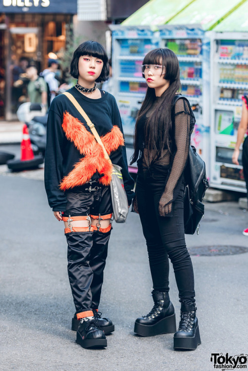 16-year-old Japanese students Sagumo and Rian on the street in Harajuku wearing dark styles with ite
