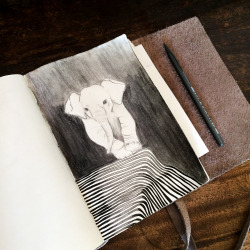 jamie-catt:  Got my nose buried in a sketchbook. 