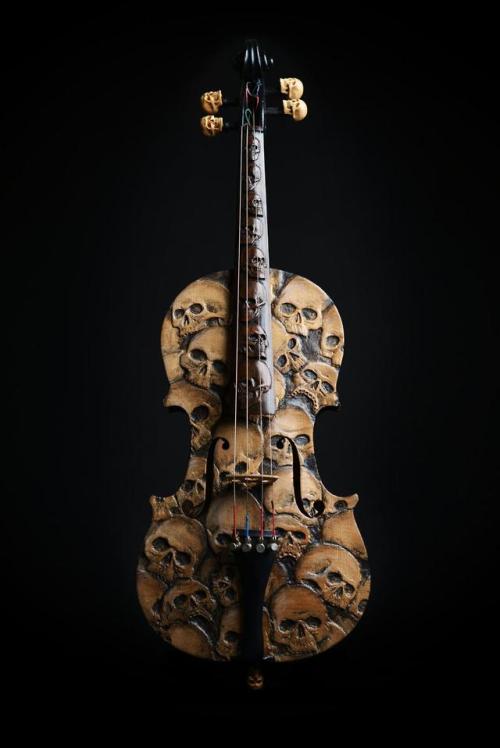 rotten-candy-art: silvarbelle: sixpenceee: This is a custom carved and painted violin. Link @popatoc