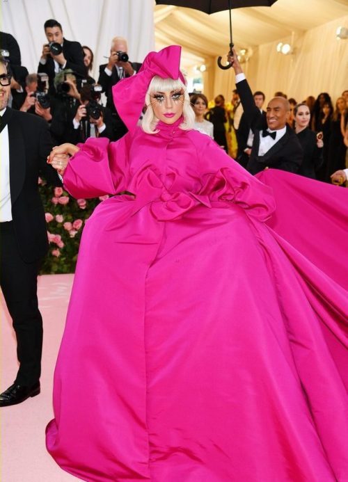 Lady Gaga Performs a STRIPTEASE on the Met Gala Red Carpet! Read here: iconichipster.com/lad