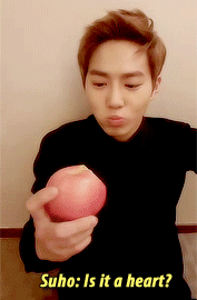 irpsychotic:  Suho almost chokes on an apple just to make a heart for EXO-L 