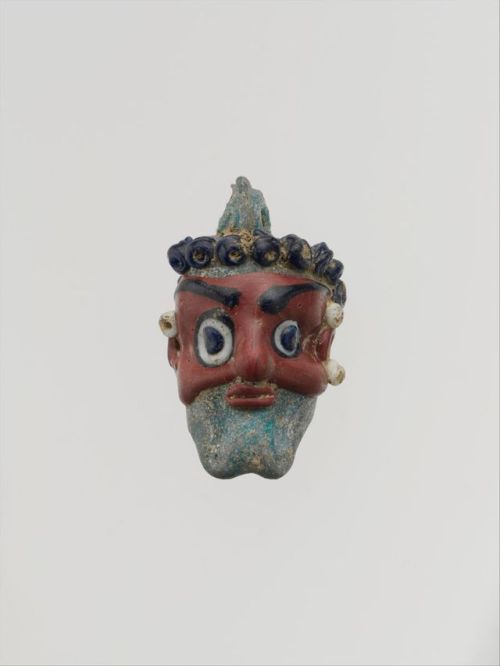 5th century B.C.E. Phoenician or Carthaginian glass head pendant