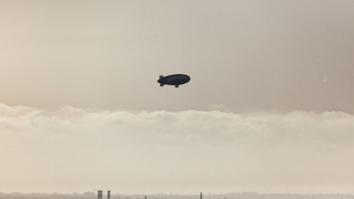 artdecodude:  Blimps certainly had their hayday during the Art Deco era. On my home yesterday going South on the 710, I see a blimp. Normally it is the Goodyear Blimp since it is moored in nearby Carson. As it gets closer, it becomes obvious it is not