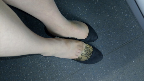 Wearing nude Silkies tights & my battered ballet pumps on the train back from a meeting.