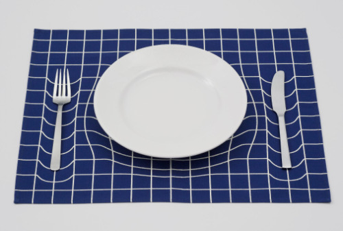 langste:  Japanese design studio A.P.Works playfully mimics the imagery of Albert Einstein’s space-time fabric theory with this mind-bending placemat. 