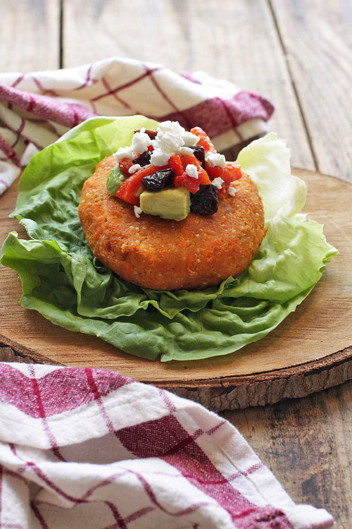 Sweet potato quinoa lettuce wrap veggie burger with goat cheese and cranberry avocado relish