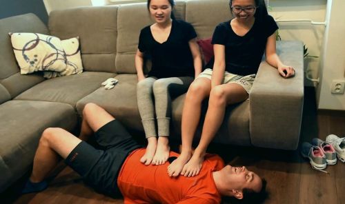 Two Vietnamese Cuties And Their Footstool