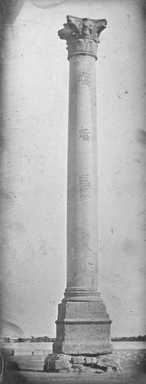 historyarchaeologyartefacts:Daguerreotype of Pompey’s Pillar with then-recent graffiti written on it in Alexandria, Egyp