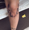 next tattoo idea, a custom olive branch/traditional flowers around my knee