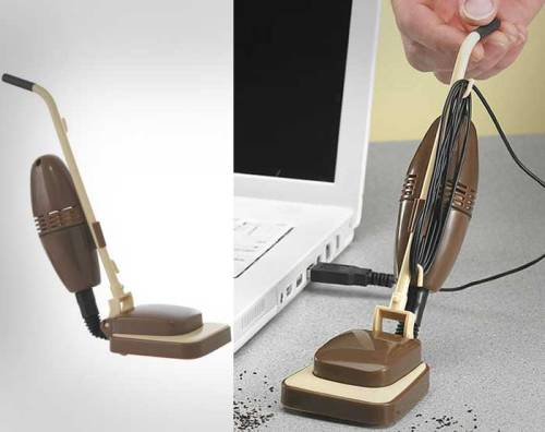 lawli:  dekufox:  odditymall:  USB Powered Mini Desk Vacuum  what an amazing time to be alive  the future is now 