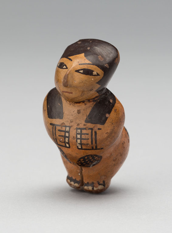 ~ Female Figurine with Tattoos.
Date: 180 B.C.-A.D. 500
Culture: Nazca
Place of origin: South coast, Peru
Medium: Ceramic and pigment