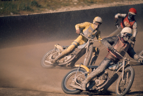 During a motorcycle race, speedsters careen into a turn in Sweden, August 1973.Photograph by Albert 