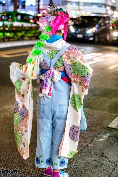 18-year-old Japanese fashion student Risa on the street in Harajuku wearing vintage floral denim ove