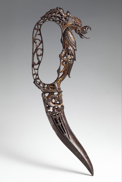 art-of-swords:  Ceremonial Bichwa Dagger Dated: 17th centuryGeography: Thanjavur, Tamil NaduCulture: Indian, ThanjavurMedium: steel, goldDimensions: overall length 8⅛ inches (20.6 cm)This intricately crafted dagger is among the best examples of ornamental