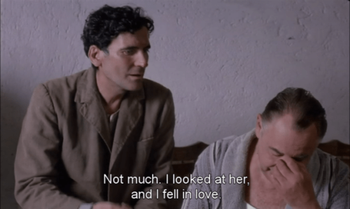 burying:  Massimo Troisi as Mario Ruoppolo and Philippe Noiret as Pablo Neruda in Il Postino (1994).